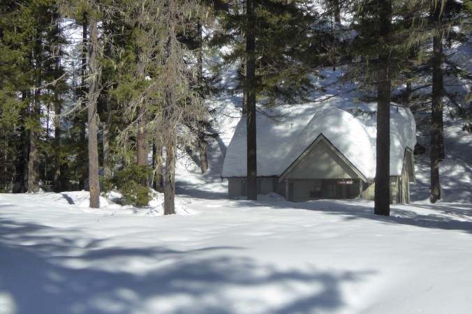 cabin in deep snow
