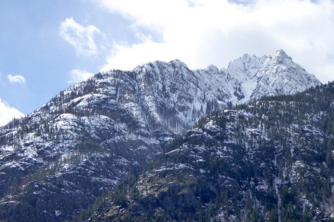 Snow covered mountain peak and ridgeline