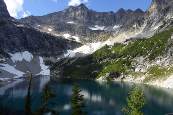 Bare mountain peak with lake below
