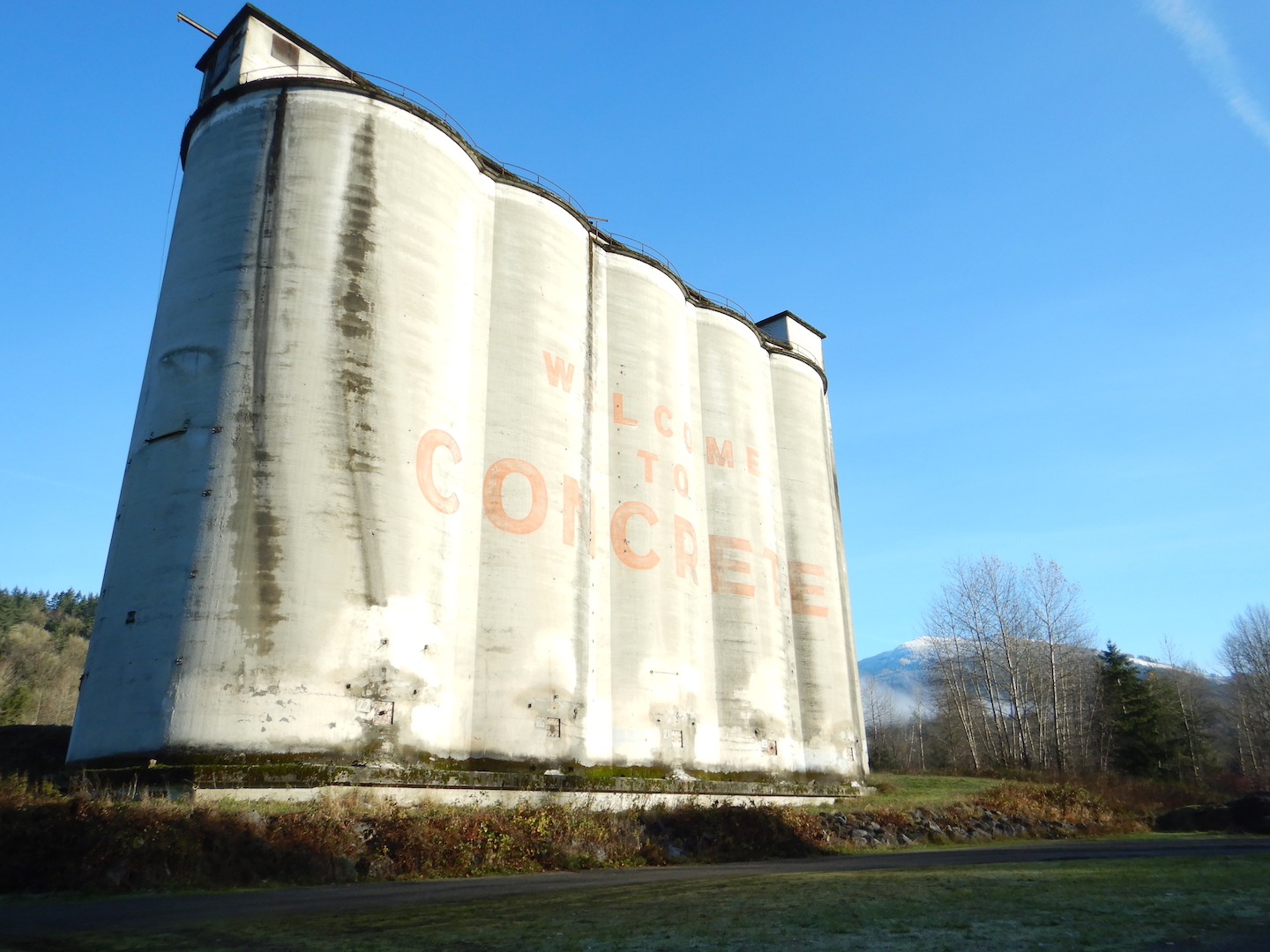 Concrete silos. Text on silos reads, 