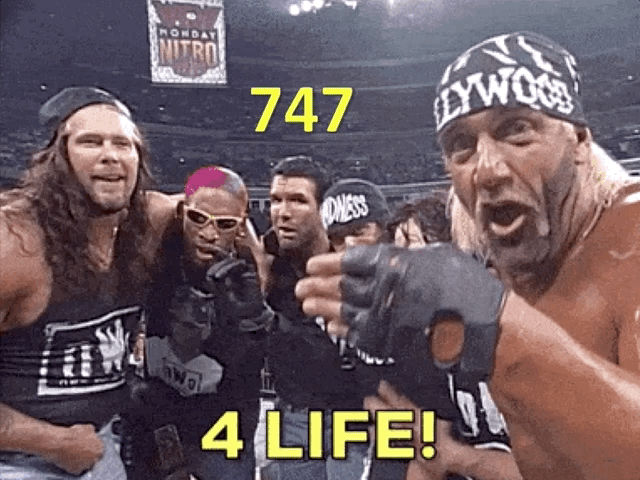 GIF of Hulk Hogan and other wrestlers signaling "for life" with hand signals.