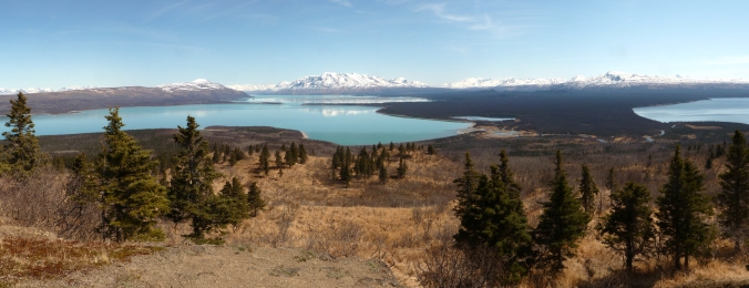 panoramic view of mountains and lakes. Snow covered mountains and volcanoes are seen on horizon
